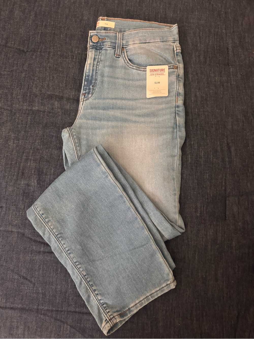 Signature Slim Light Blue Jeans never worn